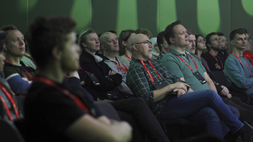 Participants engaged in a talk at the conference